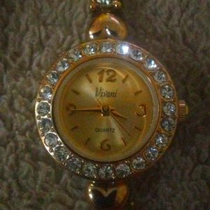 Gold and diamond watch